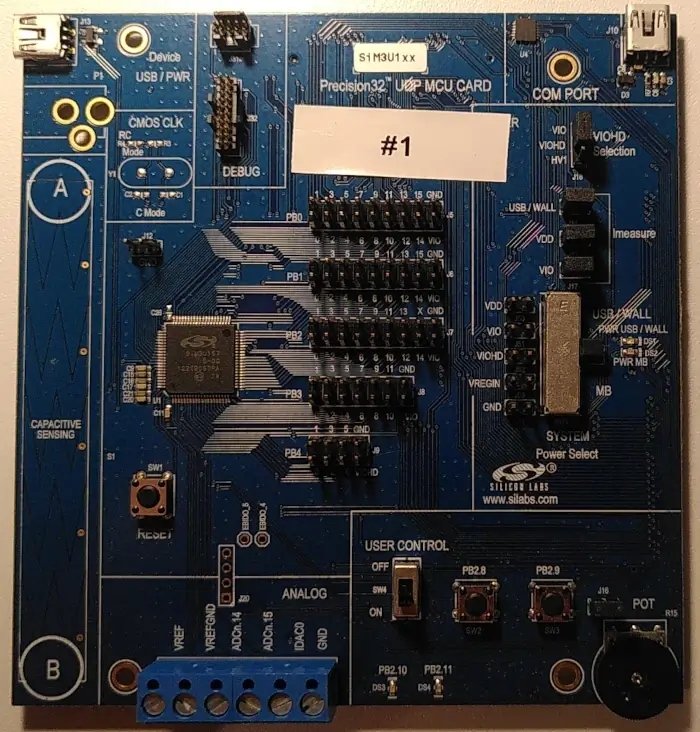 A picture of the SiM3U1xx 32-bit MCU USB Development Kit board